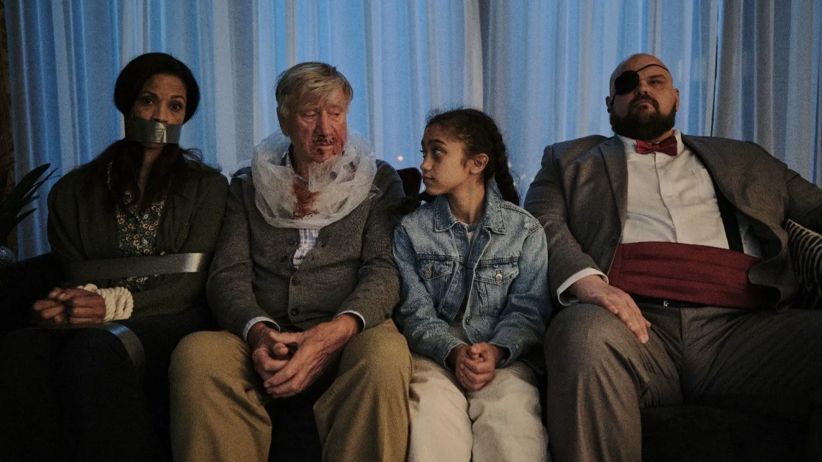 Patrick Cox as G.H. in a still from 