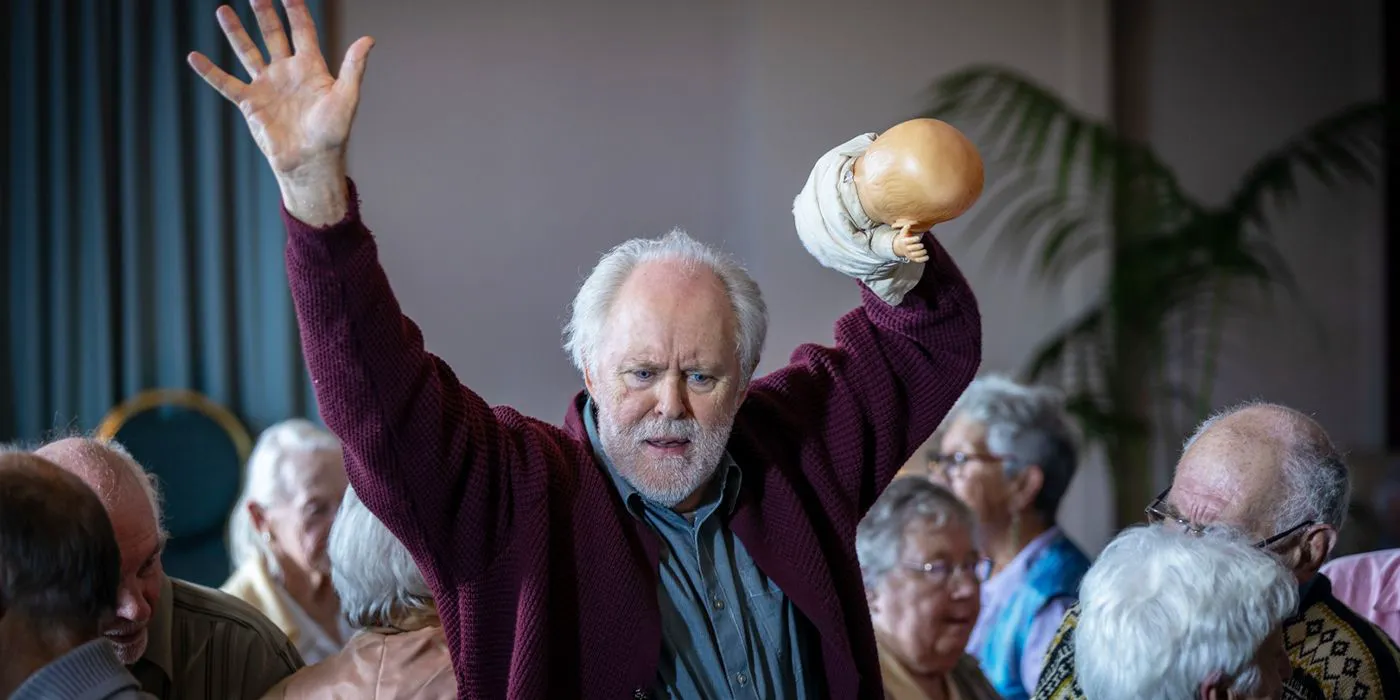 John Lithgow as Dave Creeley in a still from 