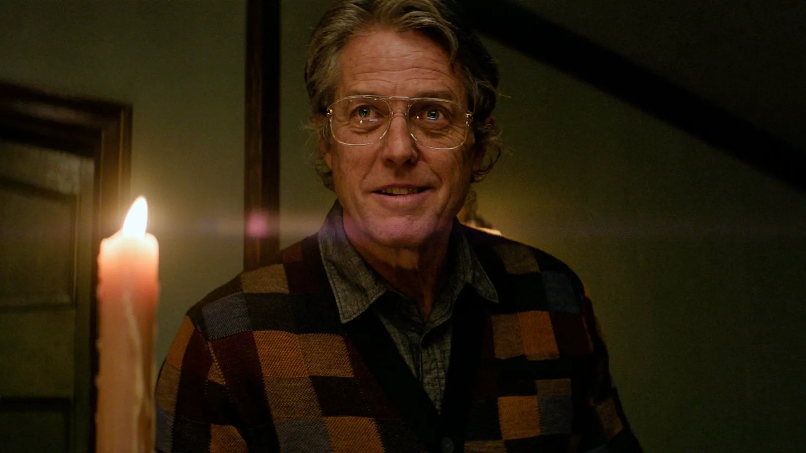 Hugh Grant as Mr. Reed in a still from 