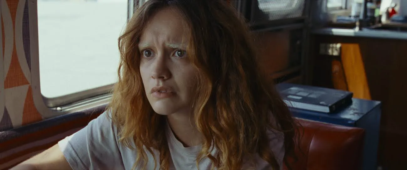 Olivia Cooke as Lou in a still from 