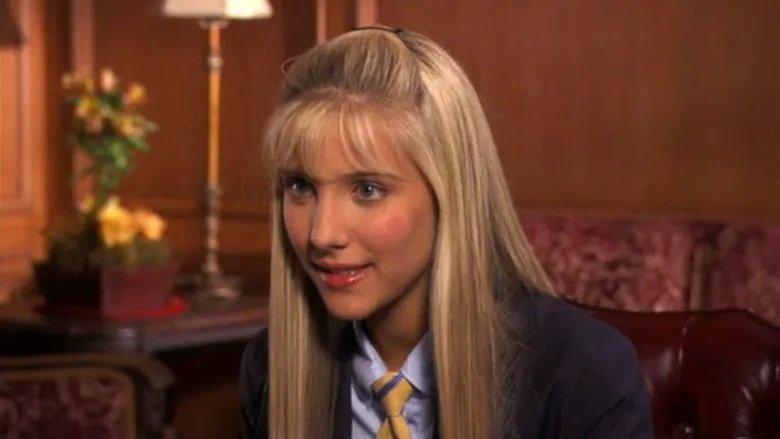 Elle Woods, poised and confident in a professional setting, ready to make a difference.