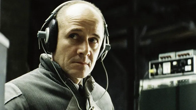 Scene from the movie showing the Stasi officer