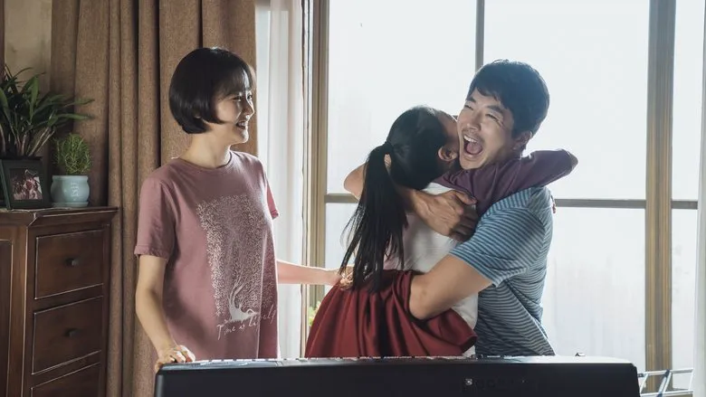Park Seok-young and Ri Myung-woon shaking hands in a significant reunion scene, symbolizing friendship and reconciliation after years.