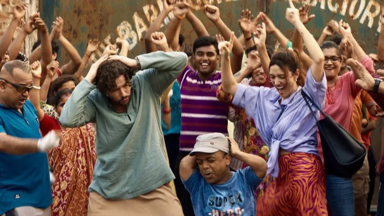 Redouane actively engaging with and teaching Indian factory workers