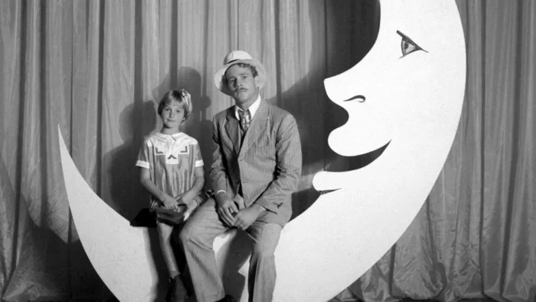 Jack, the young boy, looks up towards the sole skylight in the confined room.