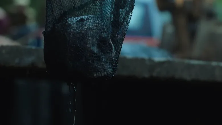 Dramatic confrontation in a gritty, industrial setting