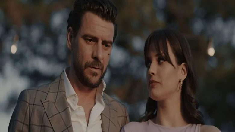 Still from 'Three' depicting Ivan and Vera in their luxurious home.