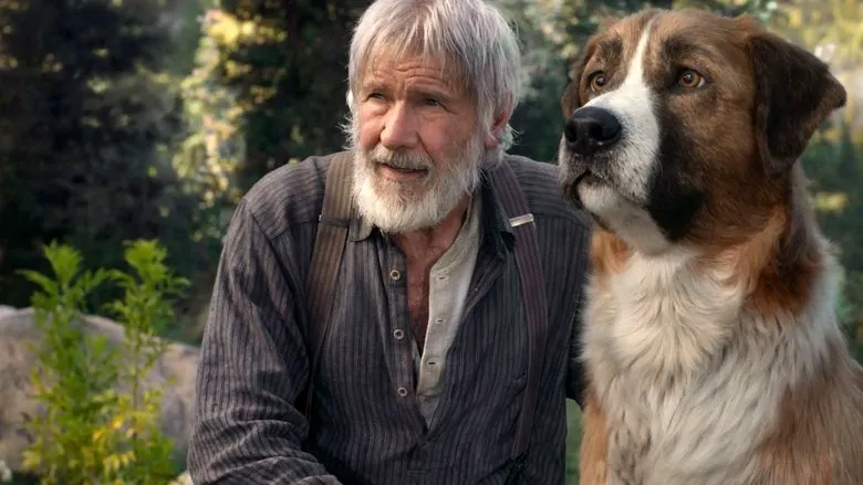 Harrison Ford as John Thornton, with Buck, sharing a tender moment, highlighting their deep bond.