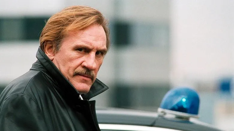 A tense scene unfolds on a dark, wet street
