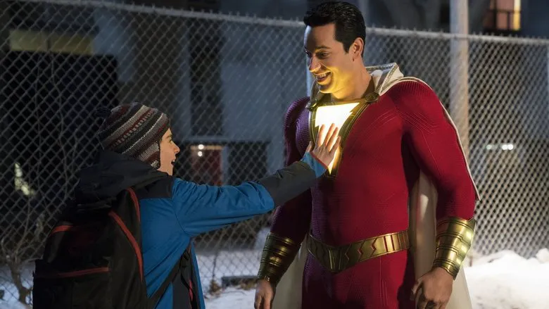 Shazam posing heroically after a battle