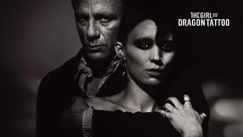 Rooney Mara as Lisbeth Salander, half-obscured by a hood, conveying mystery and vulnerability.
