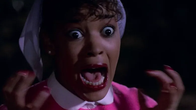 Michael Jackson mid-dance surrounded by zombies in the Thriller music video.