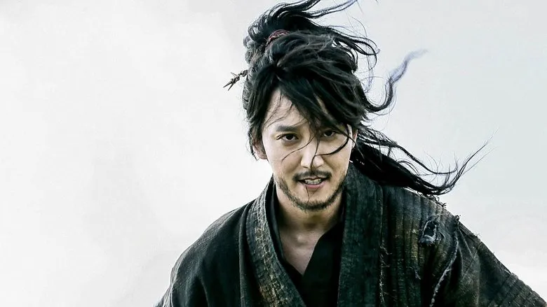 Kim Nam-gil as Jang Sa-jung, looking charismatic and ready for action, possibly onboard a ship